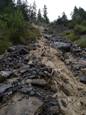 Rivière en crue dans le val de Tuors